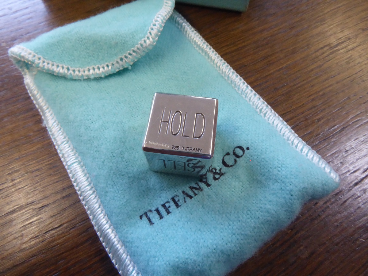 A Tiffany & Co Silver Buy, Sell, Hold Decision Dice