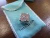 A Tiffany & Co Silver Buy, Sell, Hold Decision Dice