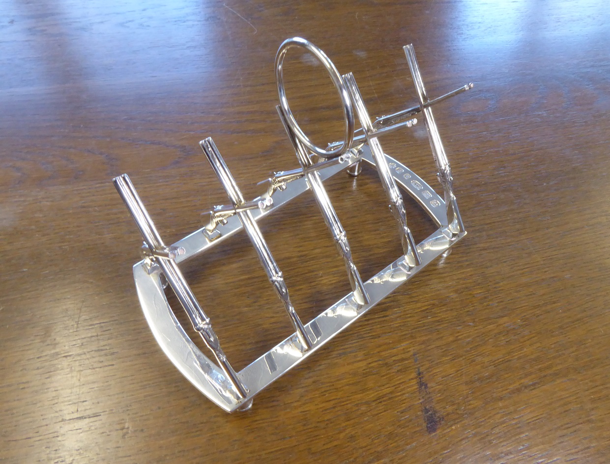 A Sterling Silver Rifle / Shotgun Toast Rack