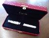 A Cartier Trinity De Cartier White Lacquer Rollerball Pen