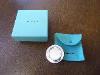 A Tiffany & Co Sterling Silver Heads Or Tails Coin