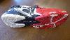 An Oversize Babolat Andy Roddick Tennis Shoe