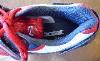 An Oversize Babolat Andy Roddick Tennis Shoe