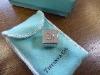 A Tiffany & Co Silver Buy, Sell, Hold Decision Dice