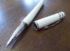 A Cartier Trinity De Cartier White Lacquer Rollerball Pen