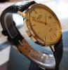 Rotary Elite 9K Gold, White Dial, Black Leather Strap